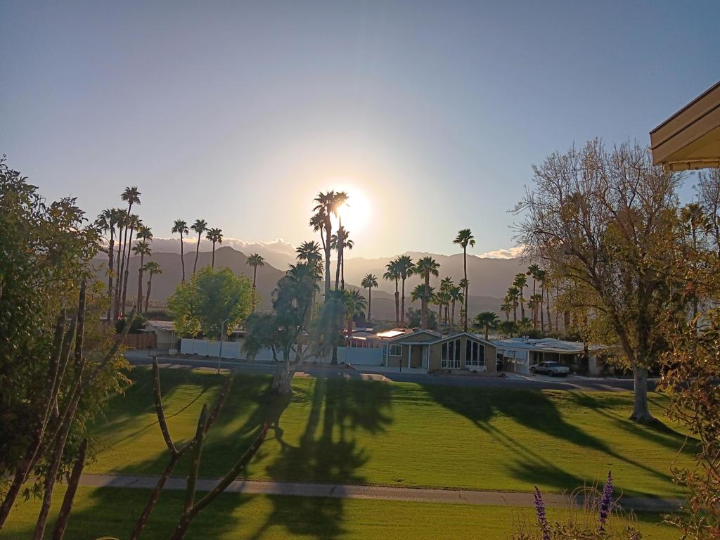 Sunset Views, Golf Course Views, Lake Views and Mountain Views all from the west facing patio. A very quiet location inside of the Park. 4 off street parking spaces and a golf cart garage that also has work benches and storage. This is a large lot with several fruit trees, multiple planters and all maintained with a sprinkler system. The patio has ceiling fans, carpet in various areas and furniture that stays with the property. There is a 5 ton AC, a Swamp Cooler along with Solar. All kitchen appliances replaced in 2023. The interior has a large 3rd bedroom off of the living room with some furniture that will not be removed by the sellers.