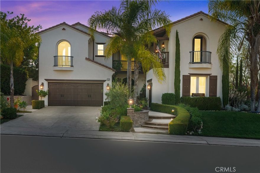 Step into luxury and comfort in this beautifully designed 4,232 sq.ft. home, perfectly positioned on a desirable corner lot with sweeping hill and sunset views. From the moment you enter, you'll be captivated by the home's spacious layout, natural light, and thoughtful design that caters to both everyday living and unforgettable entertaining. The resort-style backyard is a true showstopper—featuring a tranquil waterfall pool, a large covered patio, and ample space for lounging, dining, and making lasting memories with family and friends. Inside, a flexible floor plan includes a convenient downstairs bedroom with a full bath—ideal for guests, in-laws, or a private home office. The heart of the home is the expansive kitchen, complete with a walk-in pantry, generous counter space, and a seamless flow into the bright and airy family room, where large windows frame stunning views of the pool and waterfall. Upstairs, the luxurious primary suite offers a peaceful retreat with a cozy fireplace, a versatile en-suite space perfect for a sitting area or home office, and a private balcony that overlooks the sparkling pool and captures breathtaking sunset views. A spacious bonus room with a built-in entertainment center adds even more room to relax or play, and the convenient upstairs laundry room adds everyday ease.



Located close to highly rated and award-winning schools, shopping, toll roads, and all the wonderful amenities that come with living in the prestigious community of Coto de Caza, this exceptional home truly has it all—elegance, function, and the best of Southern California indoor-outdoor living.