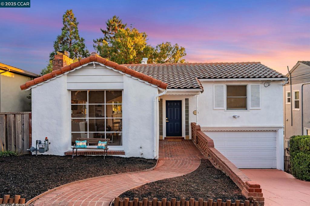 Welcome to 4663 Harbord Drive, a beautifully updated residence in Oakland’s highly sought-after Upper Rockridge neighborhood. This elegant 3-bedroom, 2.5-bath home blends timeless charm with modern comforts and sits on a premium lot with sweeping views of the Bay and surrounding hills. Inside, the thoughtful floor plan offers abundant natural light, stylish finishes, and a seamless flow ideal for both entertaining and everyday living. The updated kitchen features sleek countertops, new cabinetry, stainless-steel appliances, and a smart refrigerator. The spacious living and dining areas are framed by expansive windows that capture breathtaking vistas. The downstairs primary suite provides a private retreat with hillside views, a beautifully appointed en-suite bath, and ample closet space. Upstairs, two additional bedrooms and a full bath provide flexibility for family, guests, or a home office. A half bath and laundry room on the garage level add convenience. Outdoors, enjoy multiple decks and sitting areas perfectly designed to relax, entertain, and take in the natural beauty of Upper Rockridge.