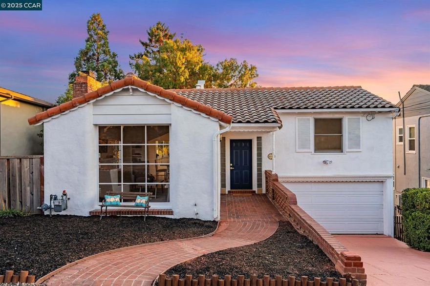 Welcome to 4663 Harbord Drive, a beautifully updated residence in Oakland’s highly sought-after Upper Rockridge neighborhood. This elegant 3-bedroom, 2.5-bath home blends timeless charm with modern comforts and sits on a premium lot with sweeping views of the Bay and surrounding hills.  Inside, the thoughtful floor plan offers abundant natural light, stylish finishes, and a seamless flow ideal for both entertaining and everyday living. The updated kitchen features sleek countertops, new cabinetry, stainless-steel appliances, and a smart refrigerator. The spacious living and dining areas are framed by expansive windows that capture breathtaking vistas.  The downstairs primary suite provides a private retreat with hillside views, a beautifully appointed en-suite bath, and ample closet space. Upstairs, two additional bedrooms and a full bath provide flexibility for family, guests, or a home office. A half bath and laundry room on the garage level add convenience.  Outdoors, enjoy multiple decks and sitting areas perfectly designed to relax, entertain, and take in the natural beauty of Upper Rockridge.
