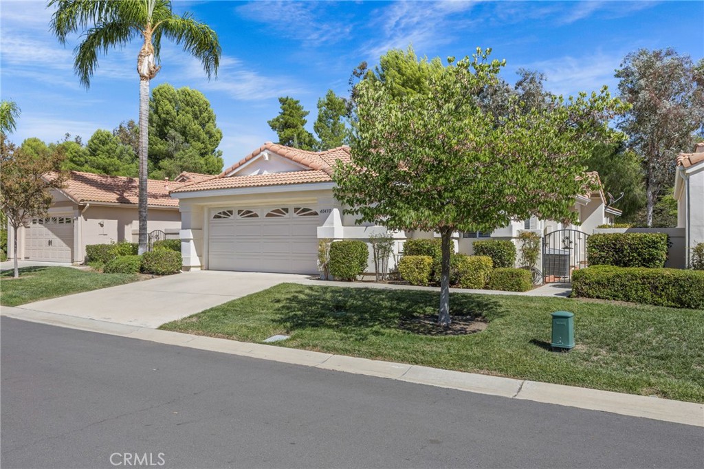 Welcome to The Colony, Murrieta’s premier 55+ community. This beautifully updated single-level home offers 2 bedrooms and 2 baths with a true open-concept design. Inside, you’ll find luxury vinyl flooring, a stack stone fireplace, and freshly painted kitchen and bathroom cabinets that add a bright, modern feel. The tall ceilings and numerous windows fill the home with natural light, creating an airy, inviting space. The large primary suite includes private sliding door access to the backyard, along with an ensuite bath featuring a soaking tub and walk-in shower.
Outdoor living is just as appealing, with a private front courtyard and a serene backyard that backs to a hill, providing both privacy and tranquility. The Colony’s resort-style amenities include a large pool and spas, fitness center, clubhouse, tennis and pickleball courts, and beautifully landscaped grounds with a variety of community activities. This is more than a home—it’s a lifestyle. If you love Golf, you're surrounded by the California Oaks Golf Club, a par 70 golf course designed by renowned architect, David Rainville.
