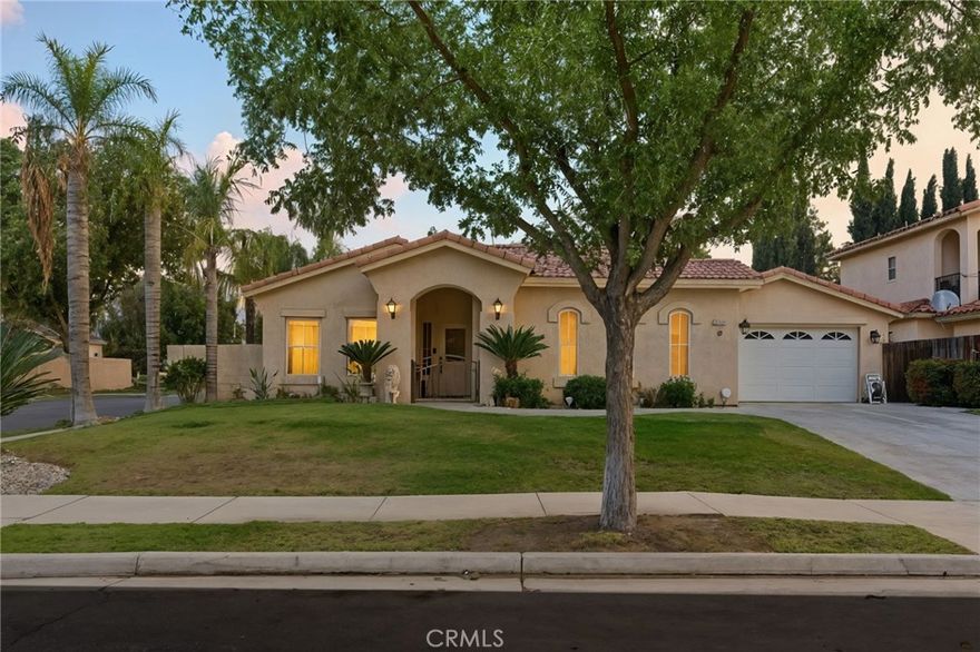 Experience refined living in this impeccably maintained 4-bedroom residence, complete with a bonus room, private office, and 2 baths spanning 2,674 sq. ft. Designed with sophistication and comfort in mind, the home offers a seamless flow through its formal living and dining spaces, a warm and inviting den, and an expansive kitchen that anchors the home with style and function. Every detail has been elevated, from the upgraded flooring throughout, crown molding, fireplace, to the elegant courtyard entry and thoughtfully designed split-wing layout. Perfectly positioned on a generous 8,276 sq. ft. corner lot, the property features a covered patio and a low-maintenance backyard ideal for relaxing or entertaining. Pride of ownership is evident at every turn—this home has been meticulously cared for and shows like a model.