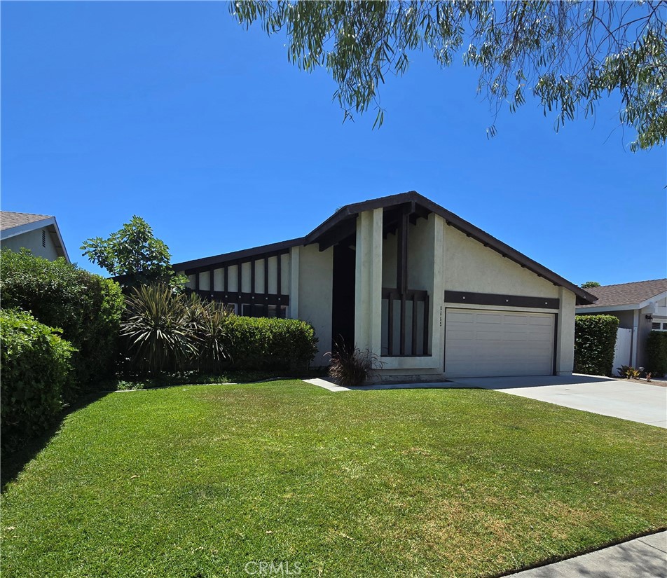 WOW!!! This is the home for you!! Great floorplan with porcelain tile floors, tile countertops, scraped ceilings, recessed lighting, white appliances, fresh 2-toned paint, newer carpet, driveway....YUM!! Patio and cover to relax and enjoy in your lush private backyard. Newer windows in the kitchen and two baths updated a few years ago including tub, shower, sinks, toilets and fixtures!! This property is pristine. This is a must see and you will love it!!! Owner will consider pets!!!!