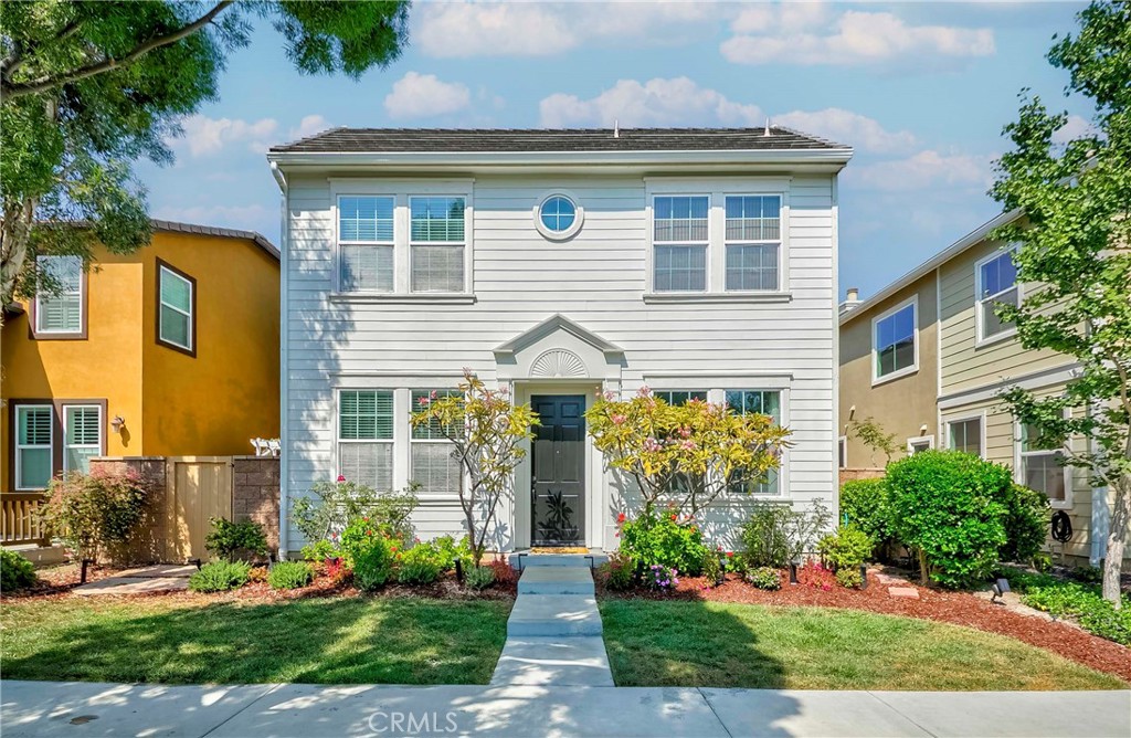 Experience the epitome of luxury living in the prestigious city of Tustin, within the highly sought-after Columbus Square neighborhood of Tustin Legacy. Newly remodeled Detached residence combines exceptional curb appeal with a tranquil location, offering approximately 2,497 sq. ft. of beautifully appointed living space on a 3,300 sq. ft. lot. 4 spacious bedrooms & 2.5 bathrooms, it features one of the community’s most desirable floor plans. A grand entry opens to an expansive layout where the formal living room flows into a versatile sitting area, and an additional room currently used as an office, both filled with abundant natural light. Remodeled gourmet kitchen showcases elegant white cabinetry, granite countertops, a large island, stainless steel appliances, recessed lighting, and generous cabinet space. Perfect for entertaining, the kitchen connects seamlessly to the dining area with direct access to the backyard, while the inviting family room centers around a cozy fireplace. Main level also includes a stylish powder room and direct access to the two-car garage. Upstairs, the luxurious primary suite offers a spacious walk-in closet and a spa inspired bath with dual sinks, a soaking tub, and a separate shower. Three additional bedrooms share a well-appointed hallway bath, and a convenient upstairs laundry room with utility sink completes the upper level. Private backyard is a serene retreat with a flagstone patio, side yard, arbor entry, and lush planter beds, ideal for morning coffee, weekend barbecues, or simply unwinding in a peaceful setting. Thoughtful upgrades include fresh interior and exterior paint, new wood & travertine flooring, crown molding, and more, no detail overlooked! As a resident of Columbus Square, you’ll enjoy resort-style amenities inc. a beautifully designed clubhouse, sparkling pool and spa, lush parks, barbecue areas, a basketball court, and thoughtfully designed playgrounds. Picturesque walking and biking paths connect the community, while top-rated schools such as Heritage Elementary (STEAM magnet) and Legacy Magnet Academy are just moments away. Enjoy shopping, dining, and entertainment at The District at Tustin Legacy and Tustin Legacy Shopping Center, or spend the day at Veterans Sports Park with its tennis, basketball, pickleball, and expansive sports fields. Conveniently located near major freeways, John Wayne Airport, and Orange County’s beaches, this home offers the perfect blend of luxury, comfort, and lifestyle.