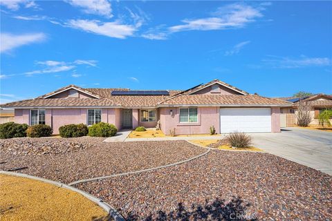 Photo of 18766 Kitom Rd, Apple Valley, CA 92308 (MLS # HD26051297)