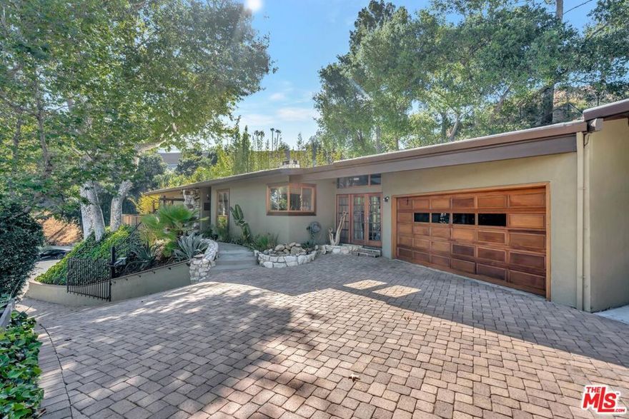 ***The home is completely VACANT with no furniture*** Add your own taste and re imagine the house! Kape Property Management is pleased to present this truly special single-family home perched at the top of a private, lush cul-de-sac. Located in the Royal Woods neighborhood of Sherman Oaks. This beautiful home consists of 3 bedrooms, 2 bathrooms, a 2-car garage, driveway, a bonus room (office/den), and a mud room. The home is thoughtfully designed with wonderful attention to detail. Each of the bedrooms is large enough for king-size furniture. The kitchen has plenty of counter space and cabinetry and is equipped with high-end appliances. Plenty of natural lights from the french doors and skylights throughout the property. The living room connects to the backyard, perfect for indoor-outdoor living. The backyard is perfect for entertaining and includes a natural rock waterfall that cascades into a fish pond and a built-in saltwater pool. The hillside provides complete privacy from any neighbors. The owner has taken great care of the property and has upgraded it with a new roof, HVAC equipment, copper plumbing, and high-end appliances. Great location for commuters with easy access to the 405 and 101 freeways. Lots of choices for shopping, beauty salons, and dining on Ventura Blvd. and the Sherman Oaks Galleria.