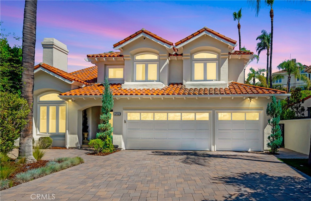Location, Location, Location! This Pristine Calabasas Hills home is located on a massive lot at the end of a cul-de-sac! A rare lot in this exclusive guard gated community, this property has it all! A long private driveway, lush landscaping and double iron doors welcome the pickiest of guests. Inside, find soaring high ceilings, LED lighting, fresh paint, the perfect combination of stone and wood flooring, new windows and more. The open layout features an expansive living room / dining room combo, gorgeous views of the impeccable backyard, a chef's kitchen with a new Sub-Zero refrigerator, new Thermador double oven, Cesar stone counter tops, sleek modern cabinetry and opens to the large family room featuring custom built-ins, and a fireplace. This beauty boasts a downstairs en-suite, newly renovated laundry room, a showcase garage, custom theater++. Follow the wrought iron staircase up and find 3 additional bedrooms. The primary suite is fit for a queen with a separate sitting area, fireplace, vanity, vaulted ceilings, and private balcony. The en-suite is renovated and stunning, featuring a steam shower and a dual-sided walk-in closet. Step outside and enjoy an oversized resort-style backyard complete with a newer pool, spa, water features, fantastic built- bbq with ample space for seating, an outdoor shower, stone firepit, and an expansive covered patio, perfect for entertaining. You will find Solar Panels, A smart pool system, Culligan water softener system and new Milgard windows throughout! Located in the Las Virgenes school district and walking distance from The Commons, Calabasas Lake, and Bay Laurel Elementary school.