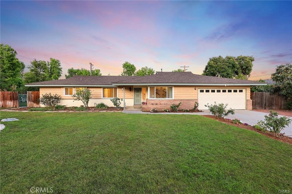 (Wide Frontage Of 131 x Depth 122 FT) A charming single-family home built in 1957,fantastic open floor plan offering a blend of classic design and modern comfort. The home boasts a Craftsman architectural style, characterized by its attention to detail and quality craftsmanship. Upgraded in 2015. including new Double pane windows,, New Garage Door, pristine Hardwood floors, Recently Fresh new paint interior, and much much more! Lovely cute covered patio was built along the rear of home, Kitchen was totally remodeled with new Stainless steel appliances, luxurious counter tops and premium quality cabinets. Family room features a lovely fireplace. Situated in a tranquil neighborhood, the property offers a wide backyard with a patio area, perfect for outdoor gatherings and relaxation. The location provides easy access to local amenities, schools, and parks, making it an ideal choice for families.