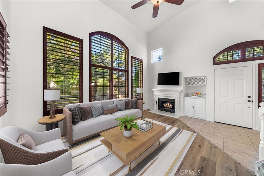 Welcome to 28 Tierra Montanosa, an end-unit showplace in the highly sought-after Melinda Heights community of Rancho Santa Margarita. From the moment you enter, soaring ceilings and abundant natural light create a spacious, modern feel throughout this COMPLETELY remodeled home.

The kitchen is a designer’s dream — featuring quartz countertops, custom full-height cabinetry, new appliances, and stylish finishes that flow seamlessly into the open-concept living and dining areas. Every detail has been thoughtfully upgraded: new flooring, lighting, interior paint, plantation shutters, and PEX REPIPE for both hot and cold water lines (NOT ALL UNITS HAVE BEEN PEX REPIPED!!  THIS ONE HAS!).  

The downstairs bathroom features a beautiful walk-in shower, while upstairs offers two spacious bedrooms, each with its own full bathroom and walk-in closet. Step outside to your wrap-around private patio, ideal for outdoor dining, entertaining, or simply enjoying tranquil California evenings — a rare find in this community!

Additional highlights include a large two-car attached garage, ONE additional parking space across from condo, a newer water heater, and close proximity to two neighborhood pools and parks. As part of SAMLARC, residents enjoy access to 13 community parks and pools, nearby hiking and biking trails, and top-rated California Distinguished schools.

Minutes from award-winning restaurants, shopping, and freeway access, this home combines luxury, comfort, and lifestyle in one perfect package.  Welcome Home!