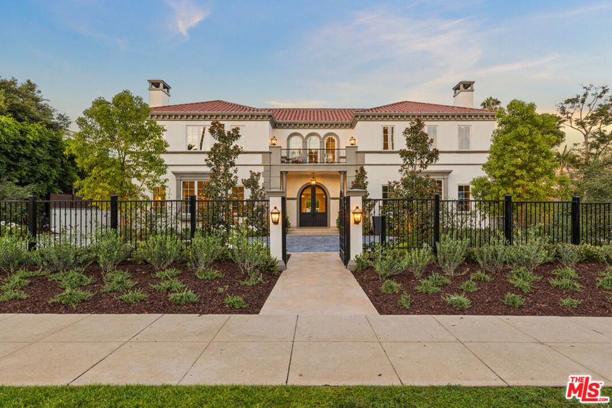 The epitome of a luxurious trophy estate in the Beverly Hills Flats. This brand new architectural triumph combines classic opulence and the modern feel of today with its exquisite features and luxurious quality finishes. Enter through wrought-iron gates into a peaceful courtyard that showcases the extraordinary scale of the home. With over ~19,000 sq ft, a voluminous atmosphere awaits, with a dramatic foyer, grand-scale rooms and an abundance of natural light. Highlights include 7 generous bedrooms, 15 bathrooms, a beautiful living room, a chef's kitchen adjacent to a great room, a gorgeous dining room and an inviting library/office with sleek bar. The primary suite features wood paneled office, sitting area, fireplace, kitchenette, dual closets and bathrooms with custom marble finishes that lead to an expansive outdoor terrace with views of the pool, patio, and manicured gardens. The basement level is drenched with natural light and includes a movie theater, home gym with sauna and steam room, game room, wine cellar with tasting room, and elevator. The inviting outdoor space feels like a resort unto itself with a sparkling pool and spa, fire pit, cabana and outdoor kitchen perfect for entertainment, relaxation and enjoying the Southern California lifestyle. Located on one of the best streets in the Flats, this once in a lifetime trophy opportunity offers its buyer the finest living experience, surrounded by the best world-class dining and leisure of Beverly Hills.