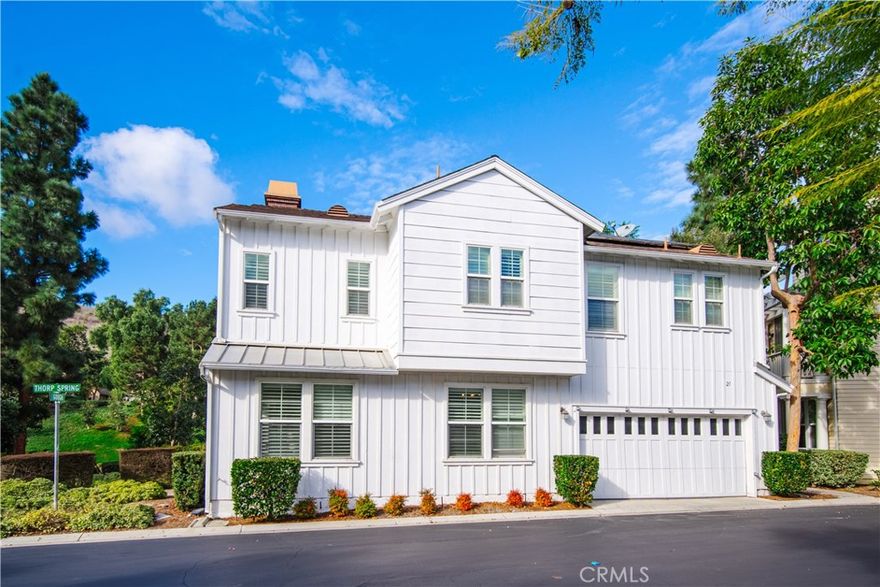 Welcome home to your new beginnings with tranquil rolling-hill views! This turn-key, complete coastal décor home is like a true 4-bedroom home, where upstairs you have 3 bedrooms + a tech/loft/Office space and on the first-floor there are custom barn doors giving the option to open or close the game/office/play area. Upon entering the home, you are greeted into the loft by high-ceilings and newly remodeled and freshly painted bullnose stairs. The kitchen is equipped with stainless steel appliances, quartz counter top with backsplash, and farm style sink. The main living area features very gracious living and dining room areas, fireplace, and additional patio area which makes it ideal for entertaining with tile flooring throughout. Upstairs you will find the romantic master suite that is complete with a retreat area, large walk-in closet, dual vanity, and a separate tub and shower. All the bathrooms have marble countertops and the showers were updated with floor-to-ceiling tiles. On the second floor you have the laundry room with linen cabinets above and new bi-fold doors, two spacious secondary bedrooms that include a Jack and Jill bathroom, plenty of linen and storage cabinets, as well as the tech/loft space. This detached home was designed to maximize its stunning views from every room. Plantation shutters are throughout the home with stunning windows to provide a plethora of natural light. The outside space includes vinyl fencing for low maintenance and an enclosed patio perfect for entertaining or pets. Additional features that are included in this home are a water softener system and PAID-OFF SOLAR for lower utility bill. Relish all the amenities that Ladera Ranch has to offer, including Award-winning Capistrano Schools, HOA paid high speed internet access, swimming pools, spas, kiddie pools, water park, splash pads, gazebos, biking and hiking trails, skate park, sport complexes including tennis, soccer, baseball, and T-ball, clubhouses, playgrounds & more! This home is a Must See!