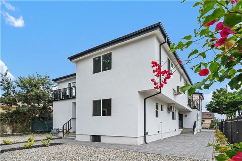 Photo of 2417 S Stanford Ave, Los Angeles, CA 90011 (MLS # SR25259617)