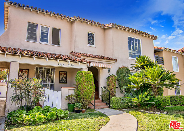 BEAUTIFUL AND SPACIOUS SPANISH DUPLEX IN PRIME BEVERLY GROVE! This character-rich duplex on beautiful Fourth Street features expansive living rooms with fireplaces and picture windows, kitchens with breakfast areas and separate laundry rooms with convenient side entries, large formal dining rooms, and center hall floor plans with three generous bedrooms including one ensuite bedroom. Each unit offers period details such as built-ins, archways, French windows, hardwood floors and period tile work. The upper unit features a large side balcony off the dining room and the kitchen, breakfast room and dining room have been opened to create a more contemporary space. There is a private shared yard and three single garages. Ideally located just a stone's throw from Third Street, The Grove, Farmer's Market and in the Hancock Park Elementary school district, this property is excellent for an owner/user or investor. Both units are tenant occupied and require advance notice to show.