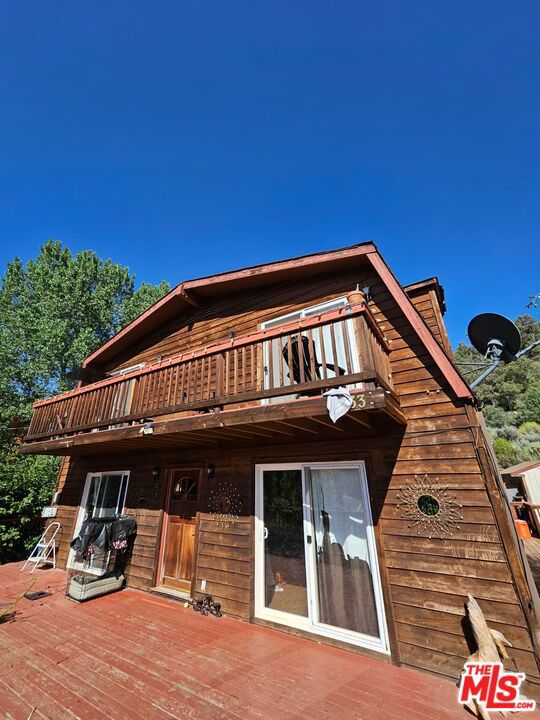 Discover the perfect blend of nature, privacy, and mountain charm in this spaciouse home tucked away in beautiful Pine Mountain Club - just a short scenic drive from Los Angeles. Set among the tall pines with sweeping mountain views, this inviting retreat features over 2,000 sq.ft. of living space and an expansive wraparound deck ideal for relaxing or entertaining under the stars. Inside, enjoy a warm and open layout with a large living room. As a resident, you'll have full access to exclusive amenities - including a private golf course, swimming pool, clubhouse, tennis court, biking, hiking trails, fishing, and more. A truly rare opportunity to own a piece of mountain paradise with year-round beauty and income potential. Perfect for investors, or anyone seeking a fixer with high upside. Great potential to update, expand, or customize - ideal as a fixer or development opportunity for the right buyer.