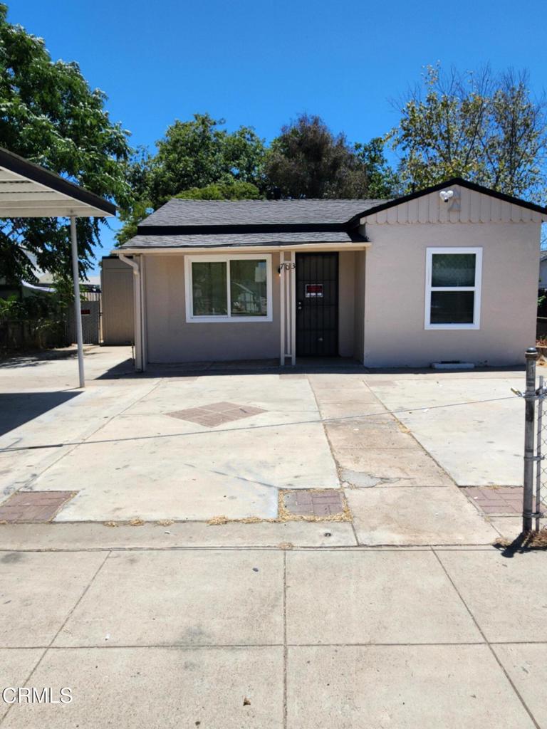 Cozy Cozy home 2 bed 1 bath with a bonus room and half bath with exterior entrance. Spacious lot with alley access Features new roof and new windows .