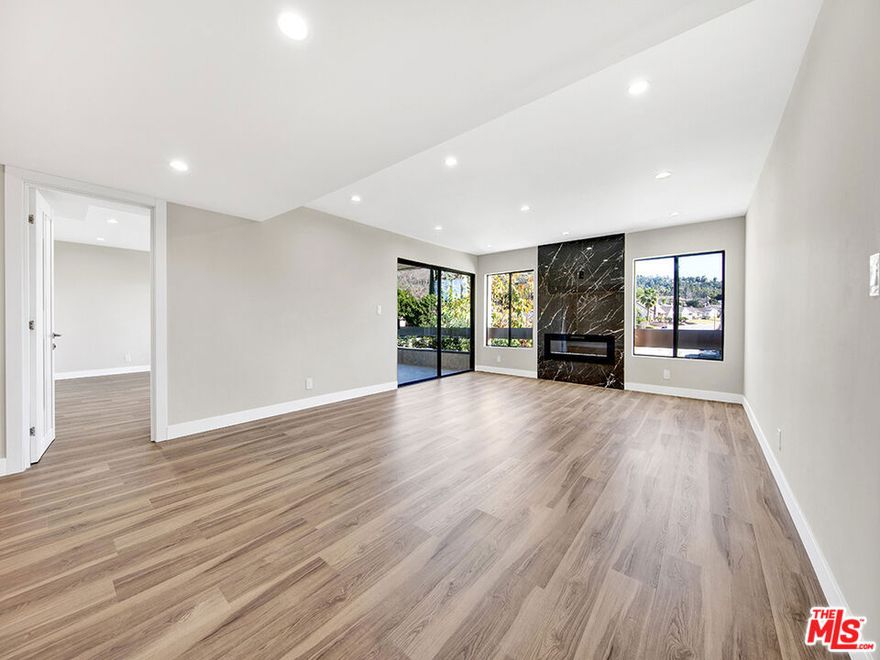 Discover this remodeled second-floor condominium in a highly coveted location near Kenneth Avenue and Valley View Street, offering mountain views directly from the private balcony. The turnkey residence features in-unit full-size laundry, an expansive primary suite with 3 closets abundant storage enhanced by custom built-in cabinetry throughout, new HVAC system with central air conditioning, and upgraded copper plumbing. Rarely available, the unit includes 3 parking spaces, while the HOA covers water, trash, and gas for effortless low-maintenance living. Move-in ready and truly exceptional, this luxurious condo is a standout opportunity in the community.