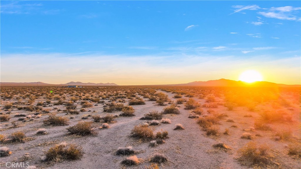19.39 ACRE'S OF LAND SOUTH OF SHADOW MOUNTAIN RD, AND APPROXIMATELY 2 MILES WEST OF HWY-395. THE POSSIBILITIES ARE ENDLESS WITH THIS PERFECTLY SITUATED PROPERTY. YOU WILL ALSO FIND THAT THIS PROPERTY IS 18-25 MINS FROM YOUR NEAREST SHOPPING CENTERS. ADELANTO, CALIFORNIA, OFFERS A RARE AND COMPELLING OPPORTUNITY TO OWN LAND IN THE MAJESTIC MOJAVE DESERT—AN EXPANSIVE HIGH DESERT LANDSCAPE WHERE WIDE OPEN SKIES, STRIKING JOSHUA TREES, AND ENDLESS HORIZONS CREATE A SETTING OF PURE FREEDOM AND INSPIRATION. JUST MINUTES FROM VICTORVILLE, ADELANTO IS CLOSE ENOUGH TO MAJOR INFRASTRUCTURE YET FAR ENOUGH TO FEEL LIKE YOUR OWN PRIVATE ESCAPE. THE HIGH DESERT CLIMATE BRINGS OVER 280 DAYS OF SUNSHINE A YEAR, STAR-FILLED NIGHTS, AND MILD SEASONS, MAKING IT IDEAL FOR EVERYTHING FROM OFF-GRID LIVING OR INVESTMENT PROPERTIES. WHETHER YOU’RE ENVISIONING A CUSTOM HOME, A SELF-SUSTAINING HOMESTEAD, A SOLAR-POWERED RETREAT, OR SIMPLY A SMART LONG-TERM INVESTMENT, ADELANTO PROVIDES THE SPACE, ZONING FREEDOM, AND GROWTH POTENTIAL TO TURN YOUR DREAM INTO REALITY. THE AREA IS ALREADY SEEING MOMENTUM, WITH SOLAR ENERGY PROJECTS, NEW HOME DEVELOPMENTS, AND THE UPCOMING BRIGHTLINE WEST HIGH-SPEED RAIL BOOSTING REGIONAL VALUE. OUTDOOR LOVERS WILL THRIVE WITH ACCESS TO OFF-ROADING AT EL MIRAGE DRY LAKE, HIKING AND CAMPING OPPORTUNITIES, AND COMMUNITY EVENTS LIKE THE ADELANTO GRAND PRIX. LIFE HERE IS PEACEFUL, SELF-DIRECTED, AND ROOTED IN NATURAL BEAUTY—PERFECT FOR ANYONE LOOKING TO ESCAPE CROWDED CITY LIFE WITHOUT GIVING UP ACCESSIBILITY. ADELANTO’S DESERT STANDS OUT AS A CANVAS FOR BOLD VISIONS AND MEANINGFUL LIVING. BREATHE EASIER, AND INVEST IN SOMETHING TANGIBLE AND FULL OF POTENTIAL, THIS IS YOUR MOMENT—AND ADELANTO IS YOUR LAND.