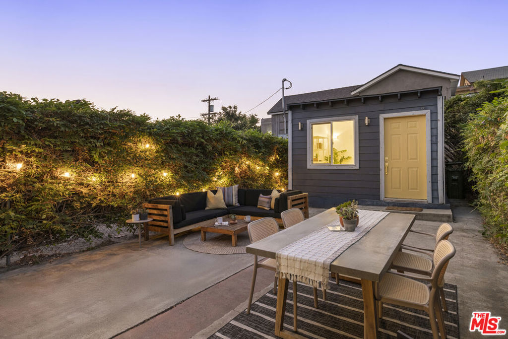 This rare Lincoln Heights bungalow is the perfect mix of charm and easy living. The classic front porch welcomes you into the thoughtfully updated home with a modern open floor plan that exudes warmth and charm. Light-filled spaces flow from the airy living room into a spacious primary suite with a sleek, contemporary bath. Set amongst the wisteria vines, the backyard offers an oasis for outdoor entertaining. A detached bonus space ideal as a creative studio, home office, or future ADU invites flexibility for the way you live and work. From here, the city unfolds at your doorstep: minutes to the buzz of DTLA, the Arts District's restaurants and galleries, games at Dodger Stadium, hiking in Elysian Park, and picnics at Echo Park Lake. Easy freeway and public transit access keeps every LA destination within reach. Sophisticated yet approachable, this is more than a home, it's a foothold in one of LA's most connected neighborhoods, ready for whatever you imagine next.
