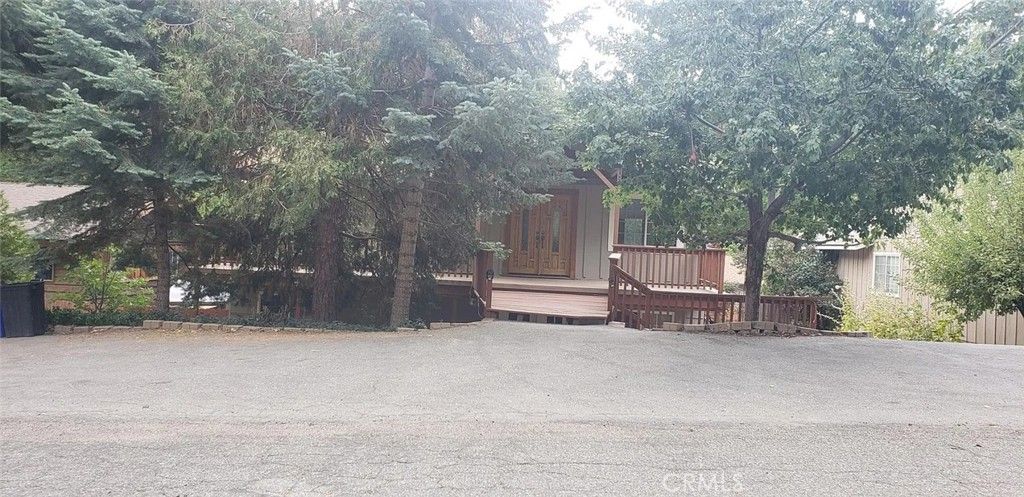 Photo of 31465 Pinehurst Dr, Running Springs, CA 92382 (MLS # IV25267703)