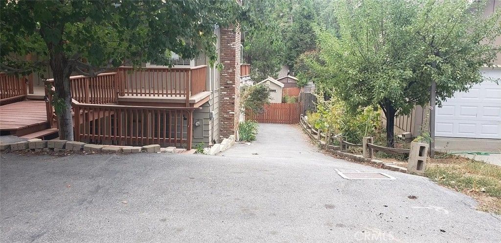 Photo of 31465 Pinehurst Dr, Running Springs, CA 92382 (MLS # IV25267703)
