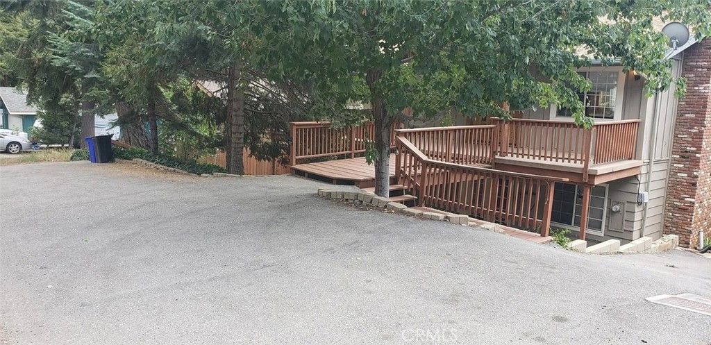 Photo of 31465 Pinehurst Dr, Running Springs, CA 92382 (MLS # IV25267703)