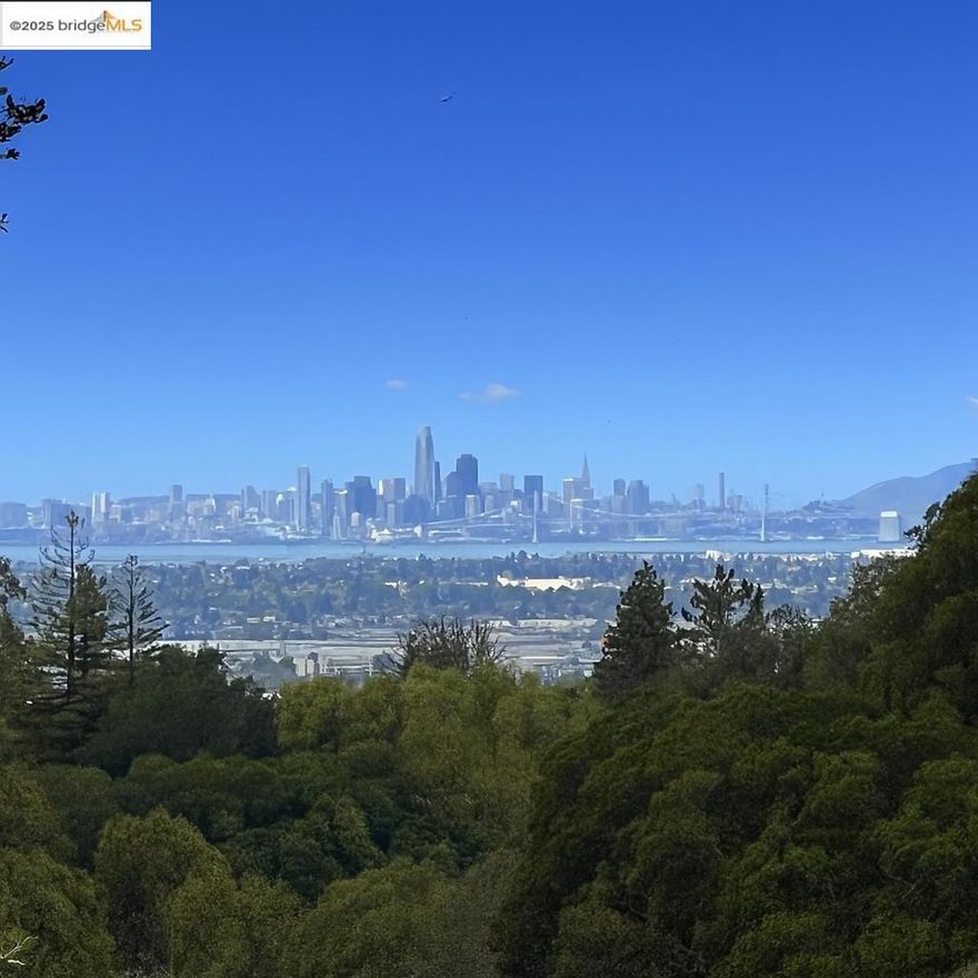 Smashing San Francisco city and Bay views! Design review-approved plans are ready for permit submittal. Four modularized/factory/prefabrication companies have reviewed this project for completion. Off site building can significantly lower costs without sacrificing quality. In fact, quality control within a factory can result in a superior house. The proposed home has an exceptional modern design that takes advantage of ample outside level living space steps away from a seasonal creek and dedicated open space. Views:  Downtown, Ridge
