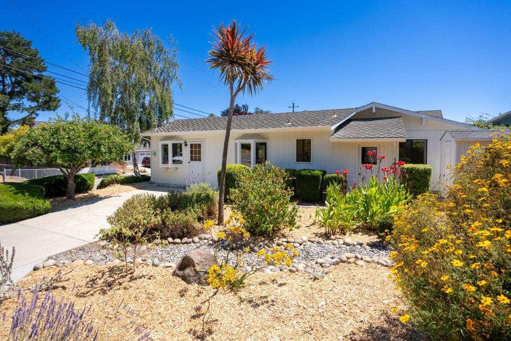 Retro chic home in desirable Prospect Heights! Enter through the front courtyard area into a truly delightful experience. Living room with vaulted ceiling, hardwood flooring, fireplace, unique, open loft area above and a formal dining area. Entertainer's kitchen with island and informal dining area. Three bedrooms, three full baths plus a large family room area with unlimited possibilities with a separate entrance which could be used as a fourth bedroom, game room, in law quarters, teenage hangout, etc. All single level with the exception of the loft area and third bedroom which are situated upstairs. Mature landscaping and private back courtyard area. Detached two-car garage. Separate laundry room and storage shed. Location! Location! Location!