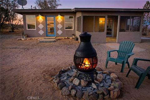 Photo of 915 Dakota Lane, Landers, CA 92285 (MLS # JT26090400)