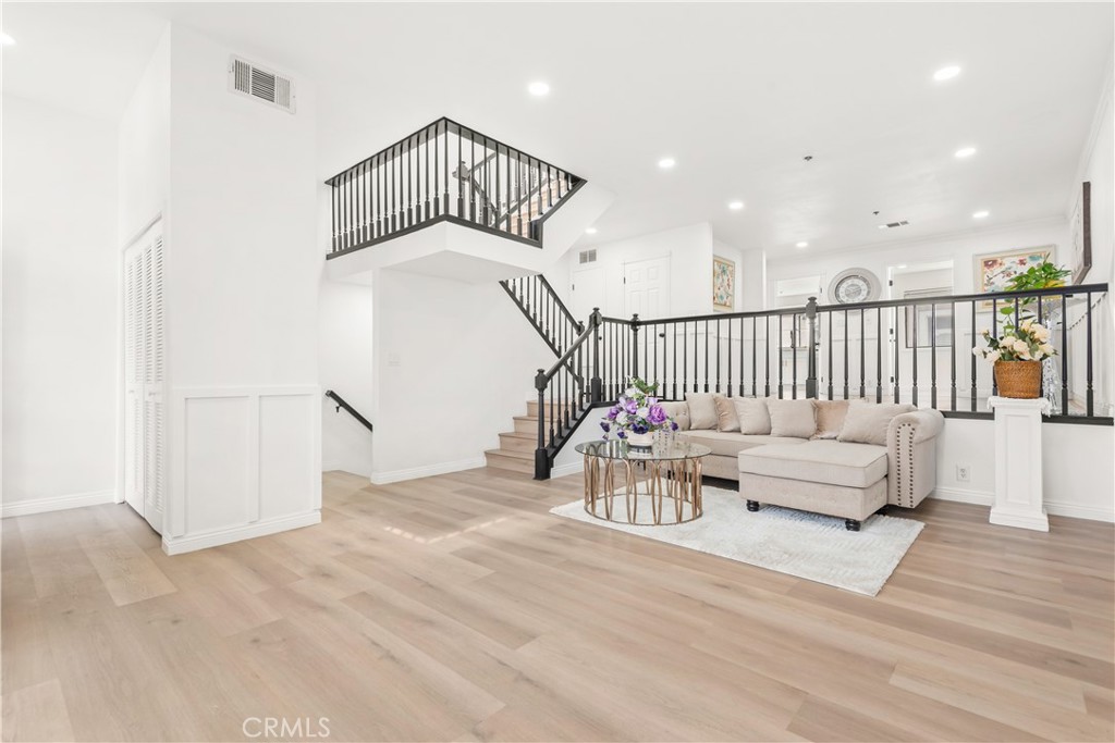 Stylish 5-Bedroom spacious Townhome with Bonus Rooms. A Great investment rental opportunity
This rare, upgraded townhome features a LARGE bonus room and sits behind a private gate in a prime city location. Enjoy a welcoming patio, soaring ceilings in the living room, and beautiful laminate flooring throughout.
Assessor records show 1656 sq. ft., but a professional measurement reveals 2000 sq. ft., plus BONUS rooms. The home has been updated with a modern kitchen, remodeled baths, crown molding.
The 2-car garage, built-in storage. Bonus room and laundry area add flexible living space.
HOA replaced the roof in 2019.