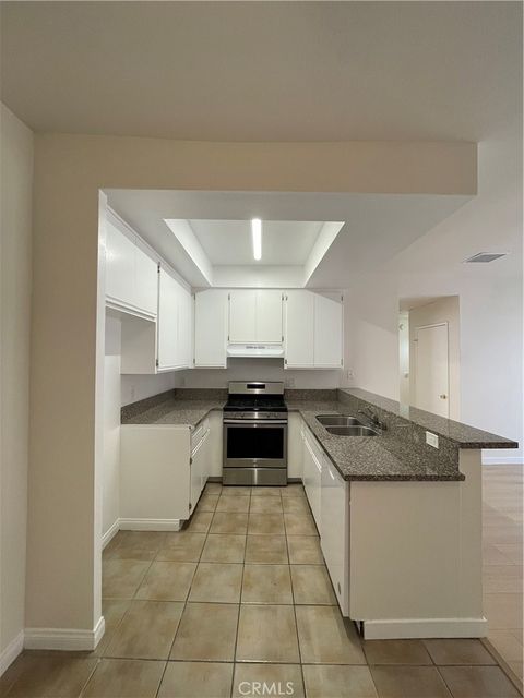 Photo of 11459 Collins Street #210, North Hollywood, CA 91601 (MLS # SR26084476)