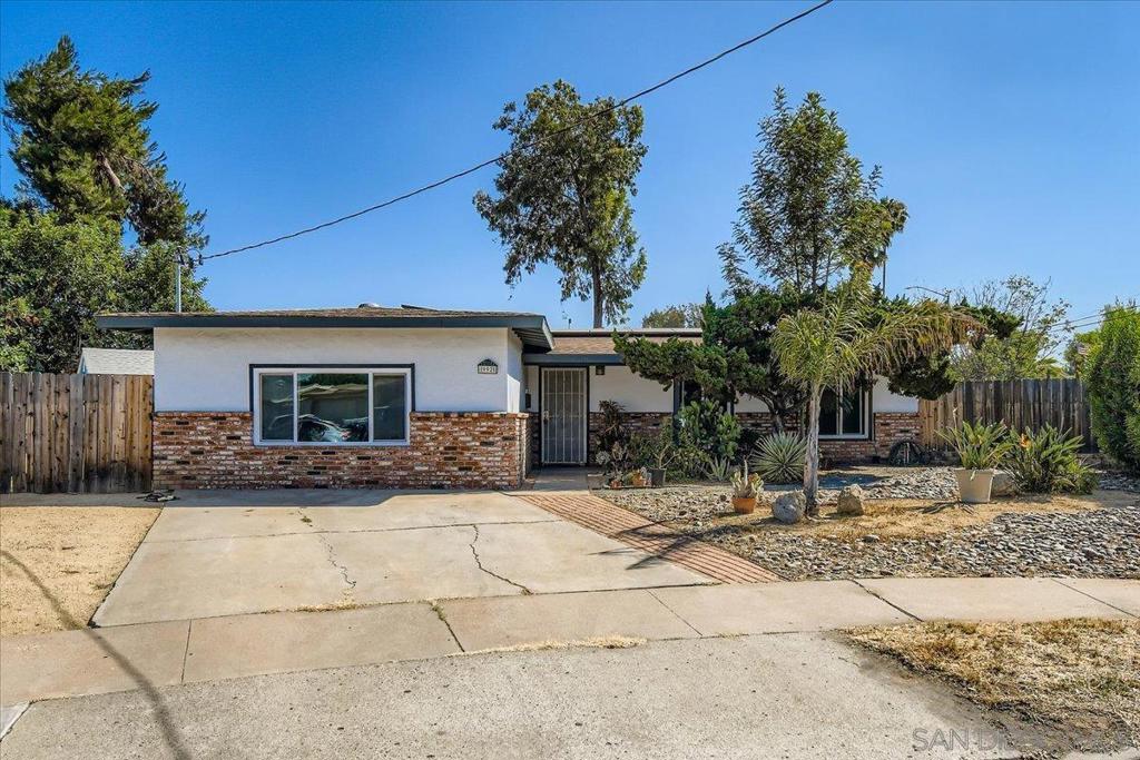 Welcome to this beautifully upgraded home nestled on an expansive 12,100 sq ft lot, offering a perfect blend of comfort, function, and outdoor space. Since 2021, the home has seen significant improvements, including a full electrical panel upgrade, solar system, and brand-new roof shingles. Also, a new central A/C and furnace, plus a split unit added for the front rooms perfect as extra bedrooms, office, or flex space. The home features new windows, a full bathroom vanity and flooring overhaul, and new flooring throughout the living room, hallway, kitchen, and utility room. The kitchen has also been enhanced with a new dishwasher and garbage disposal, rounding out the thoughtful upgrades. Outdoors, you’ll find two spacious sheds (14’x8’ and 8’x8’), ideal for storage or hobbies.