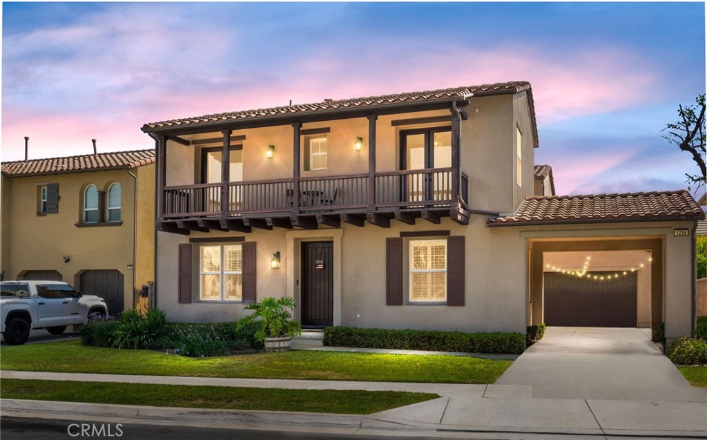 Tucked into the heart of The Colonies, one of Upland’s most cherished and community-centered neighborhoods this home is not just about square footage, it’s about that old-school sense of connection where neighbors know your name, kids ride their bikes freely, and evening walks turn into impromptu conversations under the shade of mature trees. Behind its elegant façade, this thoughtfully designed residence offers over 3,700 square feet of beautifully appointed living space, featuring 5 bedrooms, 4 bathrooms, and timeless architectural details throughout. From graceful arched walkways and beautiful wood floors to custom built-ins and well thought layout, every inch of this home blends style and function seamlessly. The expansive kitchen features a large granite island with seating for five, rich cabinetry, and is seamlessly connected to the family room with a cozy fireplace and media niche. Downstairs, a private bedroom and full bath offer flexibility for guests or multi-gen living. Upstairs, discover a spacious loft, a luxurious primary suite with a walk-in closet and spa-style bath, two Jack & Jill bedrooms with access to a private balcony, and a fourth bedroom with an adjacent bath. Step outside to enjoy your sparkling pool and spa, built for sunny weekends and late-night swims. And with solar and a 3-car tandem garage, convenience meets sustainability. Living in The Colonies means enjoying scenic walking trails, thoughtfully landscaped parks, gazebos with mountain views, and a strong sense of belonging—all just minutes from top-rated schools, local favorites, and premier shopping and dining.
This isn’t just where you live—it’s where life happens.