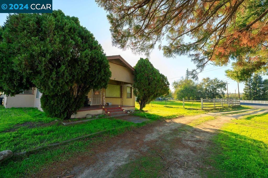 Come and See by your self, this is so cute as a Button-Ranch,room for you 4 H, animals,horses.cows.Seller has a completed and Submitted set of plans for an extensive Remodel/addition.Already moved septic.move in Ready,take your time on remodel, make this your forever home. Oh and the new Solar panel System Will be all your Included On the sale price Already Pay OFF