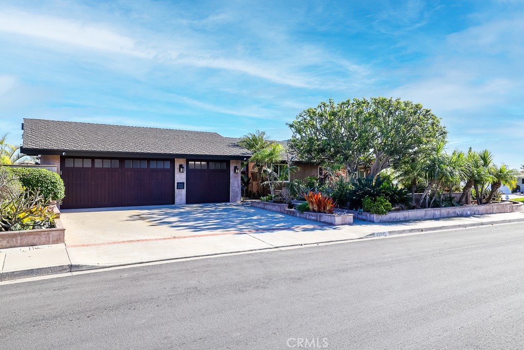 Admire ocean views in one of Southern California's most sought-after seaside communities. This single-level residence is set upon an extraordinary corner lot offering unparalleled views. This stunning residence presents 4 bedrooms and 2.5 bathrooms of exquisitely upgraded living space. The bright and open layout flows seamlessly from one room to the next, offering open concept living. The oversized master suite features vaulted ceilings, his and her walk-in closet, and a jetted jacuzzi tub. Enjoy the panoramic view while cooking in the gourmet kitchen with a new Sub-Zero refrigerator & wine cooler. The courtyard pool and jacuzzi are perfectly situated in an interior courtyard offering privacy and seclusion. This home also features a new Air Conditioner with dual zones, nest thermostat, 3 car garage with ample built-in storage, and an outdoor built-in BBQ for al fresco dining.