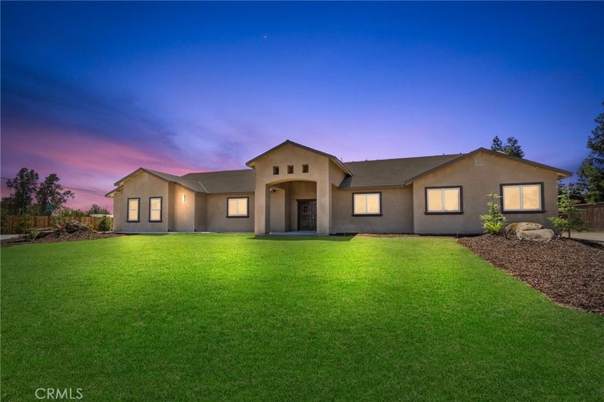 Welcome to this exquisite 4-bedroom, 3.5-bath home located in the highly sought-after McSwain area. Situated on over 1 acre, this beautifully designed home offers an ideal balance of spacious living and modern amenities. The open floor plan features 10-foot ceilings with crown molding in the great room, enhancing the home's bright, airy feel, while tile flooring throughout adds a sleek and low-maintenance finish.



The gourmet kitchen is a chef’s dream, with granite countertops, a 7-burner gas stove, and a pot filler. It opens seamlessly into the dining and living areas, creating the perfect space for entertaining. Two of the four bedrooms are suites, each with their own private bathroom, while all but one of the bedrooms include walk-in closets.



Enjoy the luxury of granite countertops in both the kitchen and bathrooms, as well as in the laundry room, which also features a built-in sink for added convenience. The home also includes a 3-car garage, RV parking, and 220-volt electrical, offering plenty of room for vehicles, tools, and heavy-duty appliances.



Energy efficiency is a key feature, with 20 paid solar panels and a 7.7kW solar system, helping to keep energy costs low. The spacious backyard provides endless possibilities for customization, from outdoor entertainment areas to lush gardens. The south side of the property is enhanced with newly planted trees for added privacy and shade, while decorative boulders in the front yard create a striking curb appeal. Front landscaping will be completed at the close of escrow, ensuring a move-in-ready exterior.



For added convenience, the home has a side entrance from HWY 140, offering easy access to the property. Located in the highly desirable McSwain area, this home combines privacy, modern living, and accessibility.



With its open floor plan, energy-efficient features, and expansive outdoor space, this home offers an unparalleled living experience. Schedule your private showing today!