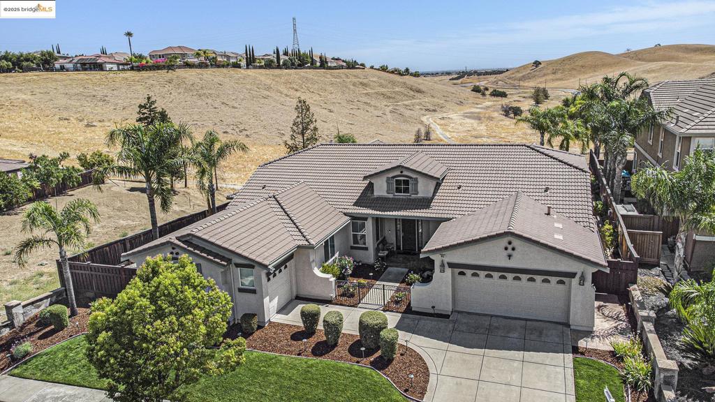 Imagine your life in this amazing turnkey family friendly home in Deer Ridge, overlooking meadows & open space. This house features a modern floor plan with 3 bedrooms & 2.5 baths. The property features a large lot at 11,262 sq. ft. It is beautifully landscaped, vast covered patio, front & back yard, with beautiful curb appeal. This home is very well-kept & move-in ready! It also features custom painted walls, tile floors, energy efficient windows, massive kitchen with extra-large island and prep sink, recessed lighting & upgraded decorative mantel fireplace. This magnificent home is situated in a friendly community neighborhood with top-rated schools. No rear/left side neighbors Walking distance to schools & minutes to FWY, shopping and entertainment.