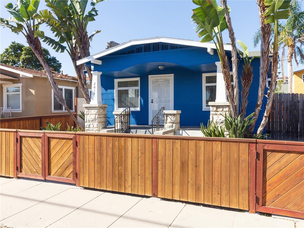 Discover this rare opportunity in the heart of San Pedro’s sought-after Point Fermin neighborhood—a charming duplex offering two fully detached homes on a single lot. The front residence is a classic 1920s California craftsman, full of character with two cozy bedrooms, one bathroom, and original hardwood flooring throughout. A spacious kitchen opens directly to the backyard, creating a seamless indoor-outdoor flow.
Tucked behind the main house, the second dwelling provides a private and self-contained living space, complete with its own bedroom, bathroom, kitchen, and living area—ideal for rental income, guests, or even a home office. Both homes share access to a secure, gated property with dedicated front and rear yards, offering privacy and flexibility.
Located minutes from coastal cliffs, serene beaches, local parks, and the vibrant energy of downtown San Pedro, this property blends historic charm with modern potential. Whether you're seeking a multi-generational living setup or a smart investment near the ocean, this unique coastal gem is not to be missed.