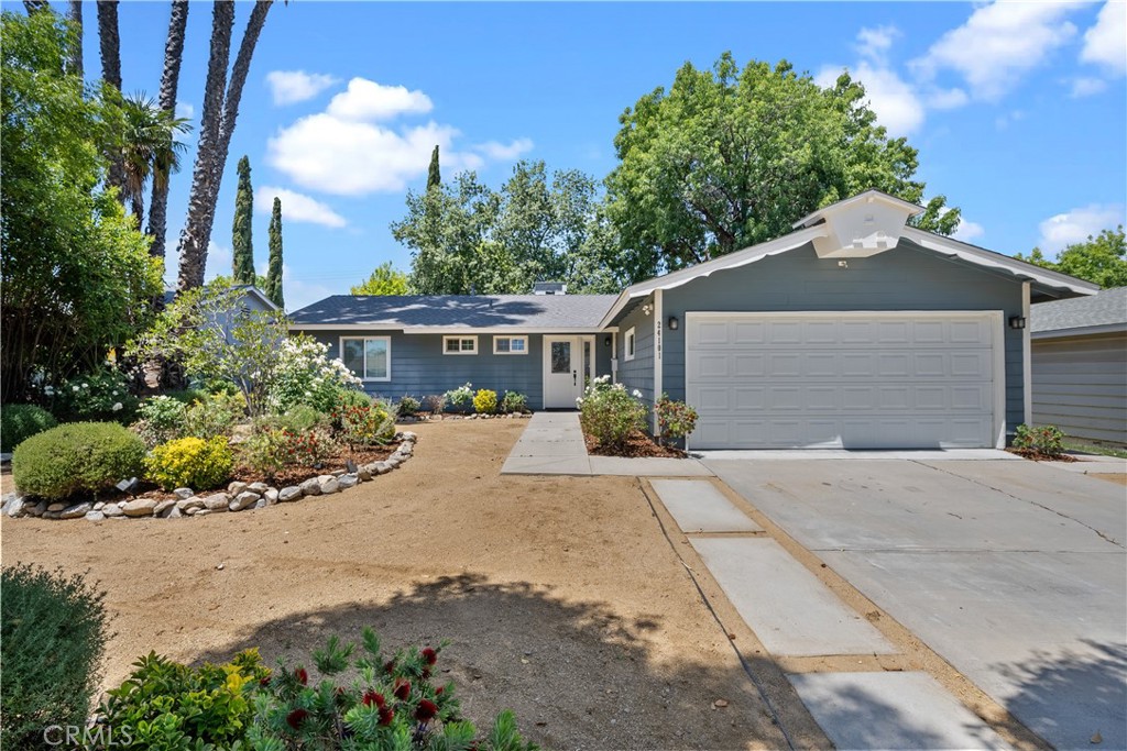 Welcome to this beautifully upgraded 3-bedroom, 2-bathroom home tucked away on a peaceful, tree-lined street in West Hills. Offering approximately 1,364 square feet of comfortable living space, this property combines thoughtful updates with everyday functionality. Step inside to an inviting layout filled with natural light, featuring a spacious living and dining area perfect for relaxing or entertaining. The updated kitchen shines with modern cabinetry, sleek countertops, and quality appliances — ready for your favorite meals and gatherings. All three bedrooms offer comfort and versatility, whether you're setting up a home office, guest room, or creating your own retreat. Both bathrooms have been tastefully renovated with clean, contemporary finishes. The large backyard is a standout feature — offering plenty of space to enjoy the outdoors, host get-togethers, or create your own personal oasis. Whether you're gardening, playing, or simply unwinding, this yard delivers. Conveniently located near shopping, dining, parks, and schools, this West Hills gem offers a great blend of comfort, style, and location.