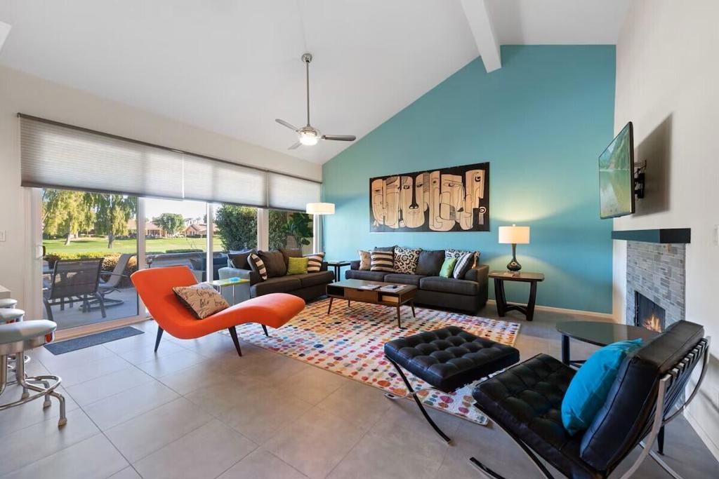 Beautifully redesigned and tastefully furnished, this updated 3000 Plan offers a sophisticated blend of style, comfort, and functionality. The home features two spacious bedrooms plus two versatile rooms--ideal for a den/media room, home office, or creative studio--as well as a separate dining area for entertaining.The sleek, open-concept kitchen includes an eating bar that seamlessly connects to the living area with vaulted ceilings, a modern gas fireplace, and sliding doors leading to a spacious, fenced patio--perfect for morning coffee or al fresco dining while taking in the golf course and mountain views.The primary suite provides a serene retreat with a spa-inspired ensuite bath. Additional conveniences include an in-unit laundry area, direct-access attached garage, and smart home features such as a Nest thermostat and keyless entry. Quality finishes are found throughout, including natural surface countertops and large-format tile flooring.Offered turnkey furnished, this home is truly move-in ready. One of Monterey Country Club's 37 community pools and spas is conveniently located just across the street. Residents also enjoy 27 holes of championship golf, an active pickleball and tennis community, bocce ball, a fitness center, and a full-service clubhouse with a lively social calendar.This property combines style, comfort, and resort-style living--an absolute must-see!