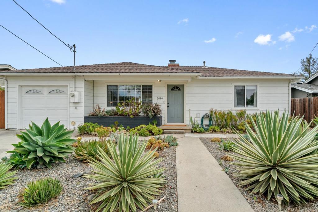 Charming classic home in sunny Santa Cruz! Two bedroom and one bathroom main home with an adorable detached cottage complete with a kitchenette and a full bathroom. Stylishly remodeled kitchen and bathroom, and a warm, sophisticated layout make this home a rare find. Cozy up to the fireplace or enjoy the generous and low maintenance back yard, this home exudes personality! Beautiful hardwood floors are easy to maintain and even easier on the eyes. The interior is bright and cheery. Whether you are inside the home or outside, the warmth of the sun penetrates every corner. It's hard to imagine a bad day when you step through the door. Very convenient mid-town location, easy to navigate around highway 1 and 17. Never sit in traffic on hwy 1 again! Cruise down to the beach, head up to the redwoods or grab a bite to eat, everything is within easy reach. This home is the perfect home base for anyone looking for quintessential Santa Cruz living.