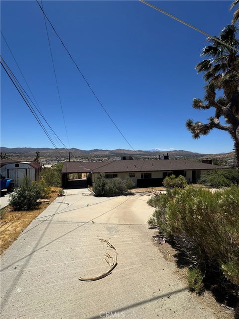 Photo of 57523 Redondo ST, Yucca Valley, CA 92284 (MLS # CV26108493)