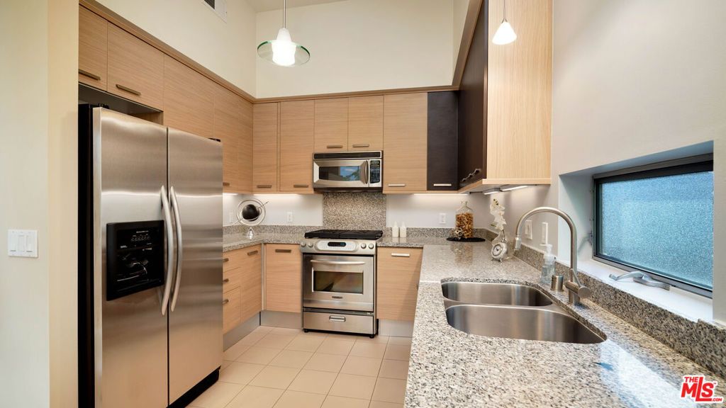 Photo of 12411 Pacific Avenue #101, Los Angeles, CA 90066 (MLS # 26641741)