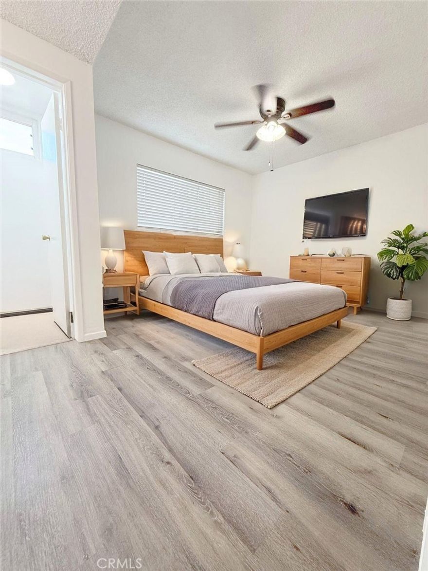 Quiet first-floor 2-bedroom, 1.5-bath unit in a gated Alhambra community. •• Gated Complex and Parking •• Recently updated with refinished cabinets, fresh paint throughout, New quartz vanities with vessel sinks RECESSED LED lighting, and upgraded switches and outlets. Features DUAL-PANE windows, hardwood floors, tiled kitchen and bath, ceiling fans, and a ••NEW A/C unit •• Kitchen INCLUDES refrigerator, oven/stovetop, and dishwasher. On-site laundry and gated pool for residents. Ample storage, one assigned parking space, and additional street parking available. Conveniently located near shopping, dining, and major freeways.