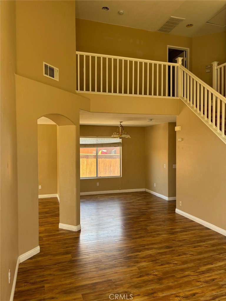 Exceptional Home in South Corona's Mountain Gate area!
Recently renovated with nice wood flooring throughout! Open Floorplan!
High Ceilings!
Light and Airy!
Nicely landscaped with a private backyard and a lemon tree!
Great neighborhood!
Just around the corner from Eisenhower Elementary School, Citrus Middle School and Centennial High School are within walking distance! Mountain Gate Community Park is nearby with walking trails!