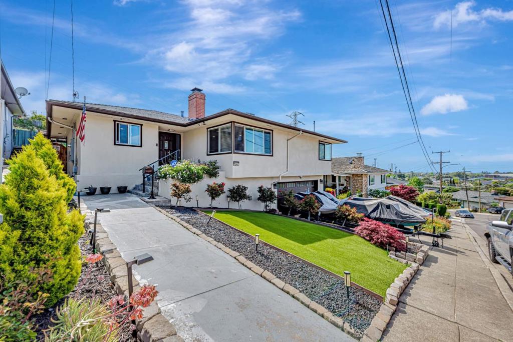 Welcome to this charming 4-bedroom, 3-bathroom home located in the Bay O Vista neighborhood, a vibrant neighborhood in the city of San Leandro. Spanning 1,841 sq ft, this residence offers a perfect blend of functionality and charm. The kitchen is well-equipped, complemented by a formal dining room ideal for gatherings. Enjoy cozy evenings by the fireplace, adding warmth and ambiance to the living space. The home features central AC and central forced air heating, ensuring year-round comfort, while energy-efficient solar power reduces utility costs. Flooring throughout the home adds a touch of elegance, and the more than one primary bedroom, including one on the ground floor, provides flexibility for various living arrangements. The convenience of laundry facilities located in the garage simplifies household chores. For families, the property is positioned within the San Leandro Unified School District. Additional features include a two-car garage and a unique poultry coop on the generous 8,525 sq ft lot. Discover the perfect combination of comfort and practicality in this San Leandro gem.