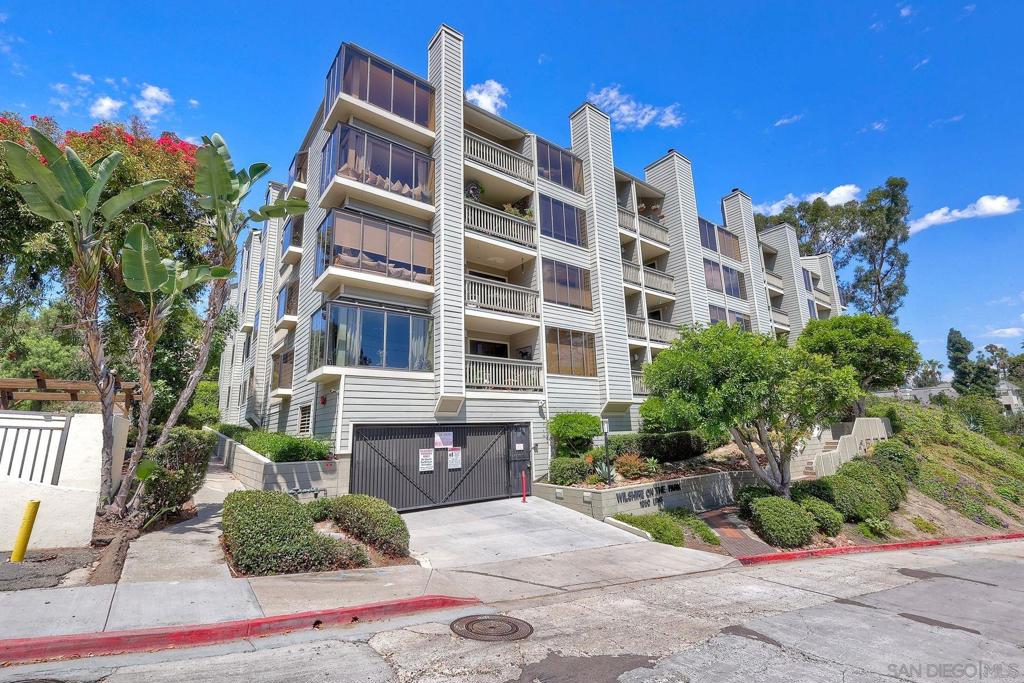 Stunning penthouse located on Balboa Park with southwest exposure and canyon/tree top views. This 2 bedroom/2 bath corner unit has over 1,400 sq.ft., two balconies, two underground gated parking spaces and private storage. Top floor amenities include vaulted ceilings, skylights, private attic area & built in bedroom cabinets. Expansive primary suite with walk in closet, dual sinks and soaking tub. Guest bedroom w/ balcony access & hidden closet(behind built in cabinets!) Loads of natural light with atrium style windows in the living room-perfect for lounging next to the fireplace. Hardwood floors in several rooms with a bright foyer and full sized laundry in closet. Kitchen has been tastefully updated and features a welcoming nook area with balcony access. Stay cool with the canyon breezes, or turn on your air conditioning for those toasty summer days.