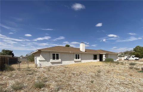Photo of 22764 Powhatan Road, Apple Valley, CA 92308 (MLS # IG25189067)