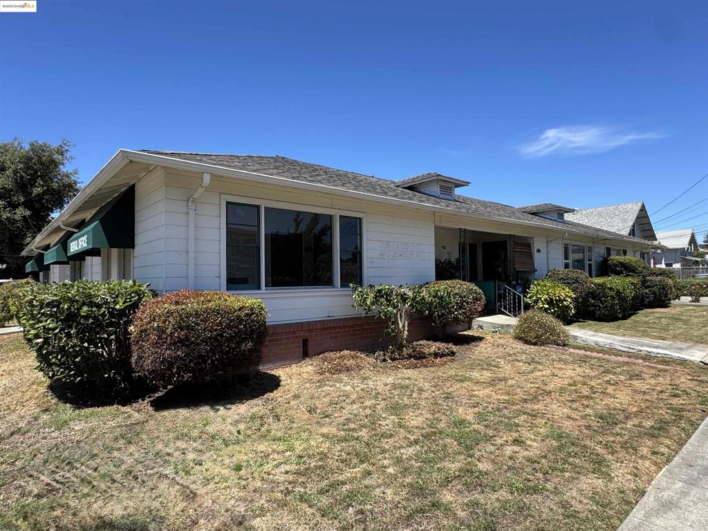 Well-located 4-unit mixed-use property on a prominent corner lot in the heart of San Leandro; features three spacious one-bedroom residential apartments plus a long-standing dental office (now vacant), providing both steady rental income and commercial opportunity. The property’s desirable corner location offers excellent visibility for the commercial tenant, while the residential units benefit from a quiet neighborhood feel with easy access to local amenities. Tenants enjoy proximity to downtown San Leandro shops, restaurants, public transportation (BART ±0.7 miles), and major commuter routes, including I-580 and I-880. Whether you’re an investor seeking stable, diversified income or an owner-user looking to occupy the commercial space, 400 Joaquin Ave represents a rare chance to own a relatively turn-key mixed-use building in downtown San Leandro. The property benefits from a detached 4 car garage, plus additional storage for tenant convenience. Built in 1951, the property has a classic appeal with each of the residences offering spacious kitchen and living areas and front and rear entrances plus individual washer/dryer hookups. The dental office comes equipped or check with City for allowable office uses.