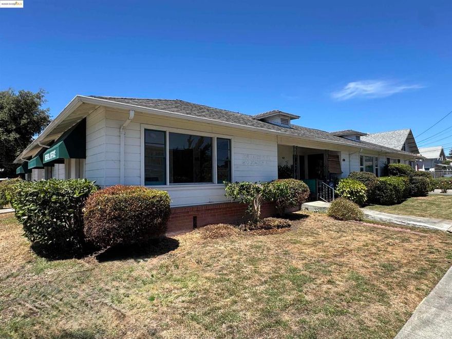 Well-located 4-unit mixed-use property on a prominent corner lot in the heart of San Leandro; features three spacious one-bedroom residential apartments plus a long-standing dental office (now vacant), providing both steady rental income and commercial opportunity. The property’s desirable corner location offers excellent visibility for the commercial tenant, while the residential units benefit from a quiet neighborhood feel with easy access to local amenities. Tenants enjoy proximity to downtown San Leandro shops, restaurants, public transportation (BART ±0.7 miles), and major commuter routes, including I-580 and I-880. Whether you’re an investor seeking stable, diversified income or an owner-user looking to occupy the commercial space, 400 Joaquin Ave represents a rare chance to own a relatively turn-key mixed-use building in downtown San Leandro. The property benefits from a detached 4 car garage, plus additional storage for tenant convenience. Built in 1951, the property has a classic appeal with each of the residences offering spacious kitchen and living areas and front and rear entrances plus individual washer/dryer hookups. The dental office comes equipped or check with City for allowable office uses.
