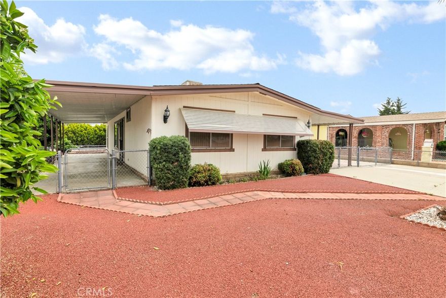 Welcome to Monte Vista Estates — a 55+ Age-Restricted Community!



This beautifully maintained home is nestled at the foothills of Hemet, offering stunning views of the San Jacinto Mountains. Move right into this spic-and-span three-bedroom, two-bath home, freshly updated with new paint and flooring throughout.



Enjoy an open floor plan that seamlessly combines the living room, dining area, and kitchen—perfect for comfortable living and entertaining. The kitchen features upgraded countertops and modern appliances, while the dining area boasts built-in cabinetry, vaulted ceilings, and ceiling fans that fill the space with natural sunlight, creating a bright and cheerful atmosphere.



Situated on a desirable corner lot, the property also includes covered RV access and a detached two-car garage—ideal for your vehicles, toys, and hobbies.



Whether you're looking for a peaceful retreat or an active lifestyle in a welcoming 55+ community, this home is a true treasure.



Don’t miss out—schedule your visit today!